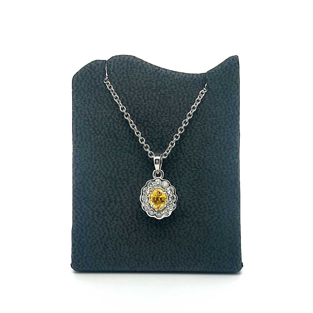 18ct wg yellow sapphire and diamond cluster pendant and chain, saph: 0.40ct, dia: 0.30ct, H,VS.