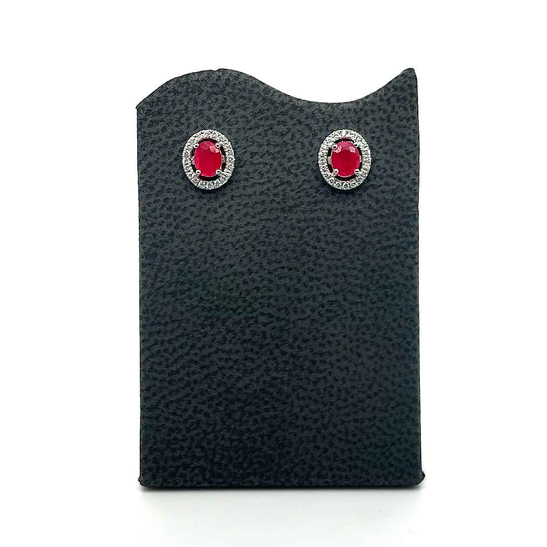 Oval ruby and diamond halo studs, 18ct white gold, diamond 0.20ct, ruby 0.90ct